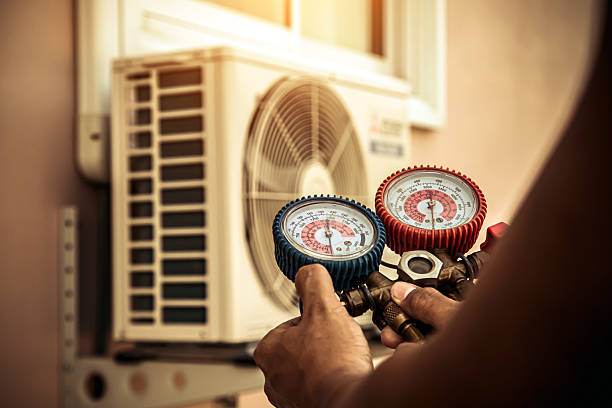 Professional Heat Pump Repair technician working in Adell, WI